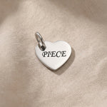 Silver missing piece heart charm for keyring symbolizing love, connection, and meaningful emotional bonds