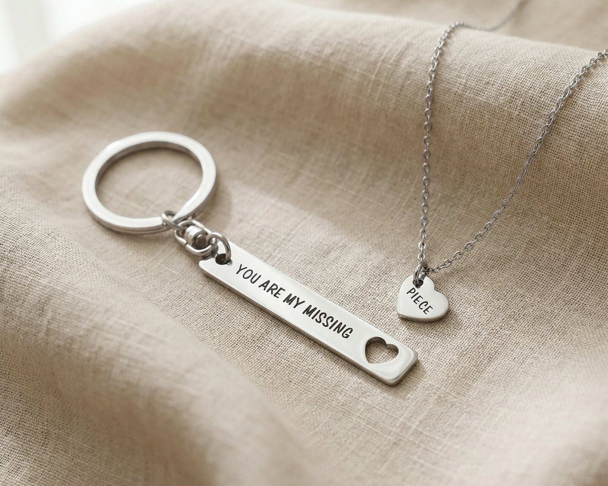 Missing piece necklace and keyring set in silver with engraved detail, matching keepsake