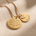 Mother forever necklace in gold with layered pendant design, two engraved discs and heart charm keepsake jewellery