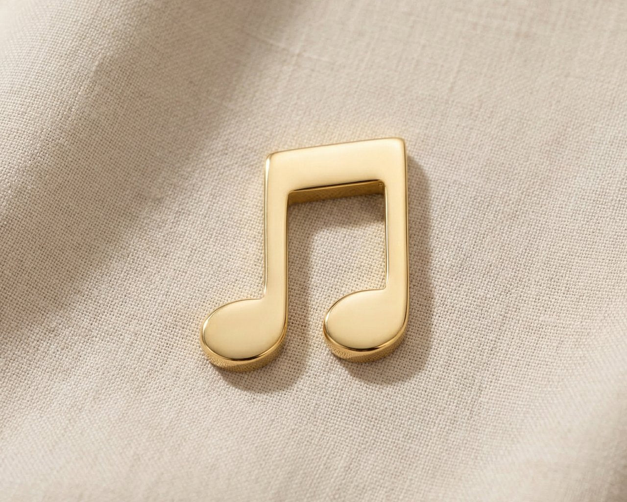 Gold music note charm for Dream Locket bracelet symbolizing passion for music, creativity, and meaningful memories