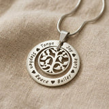 Silver My Family Tree necklace with circular pendant featuring tree of life design