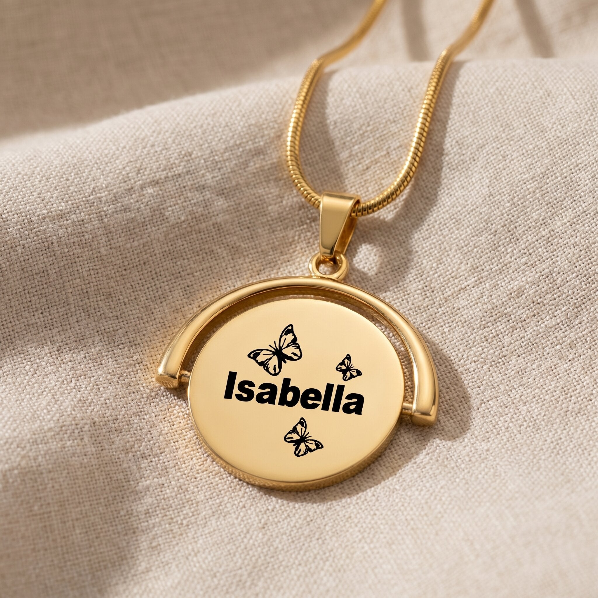 Spinning name necklace in gold with personalised engraving, hidden message keepsake jewellery