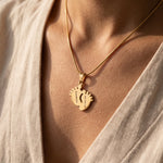 Woman wearing new life necklace with engraved detail, elegant everyday sentimental jewellery