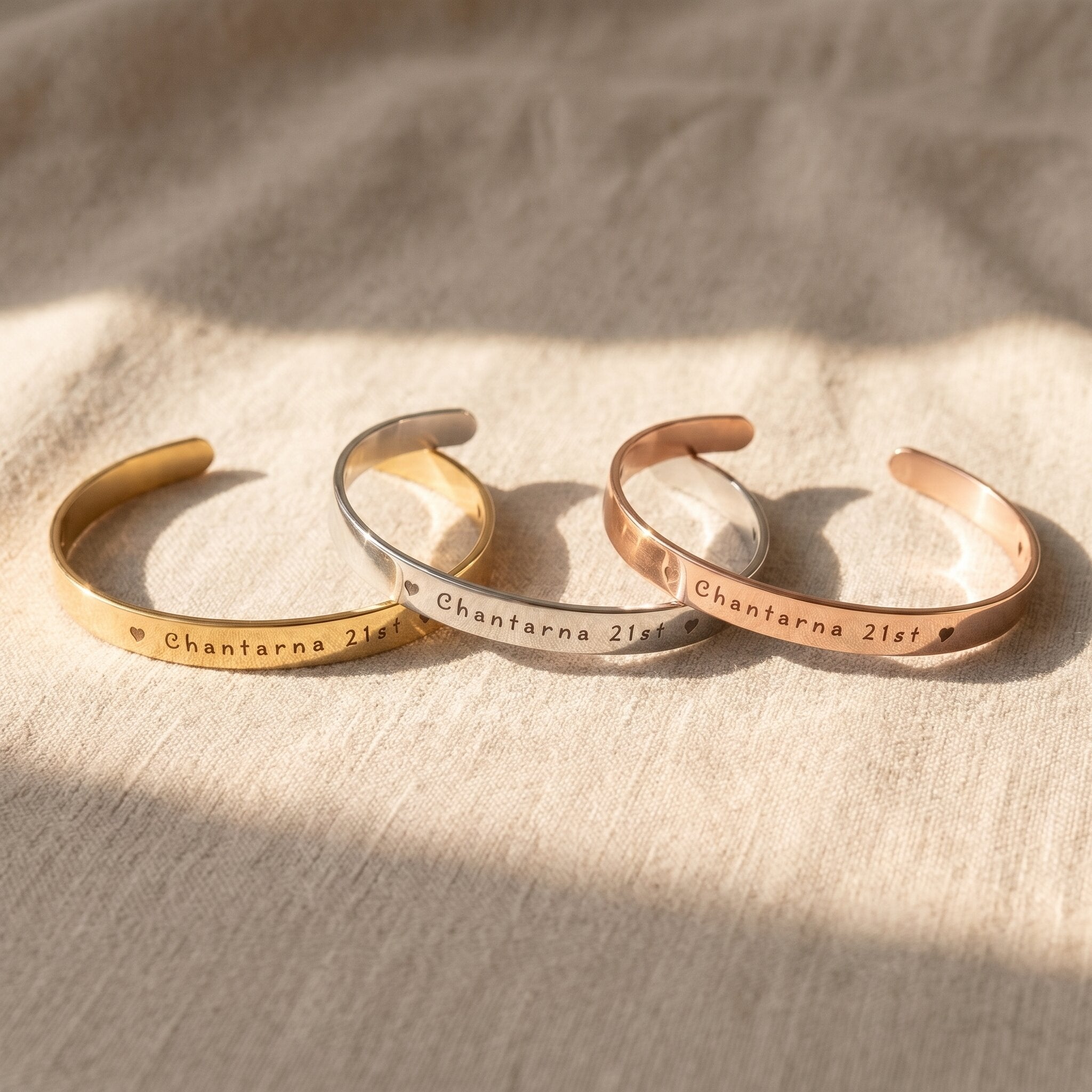 Open cuff bangle tone comparison showing gold, silver and rose gold engraved jewellery finishes