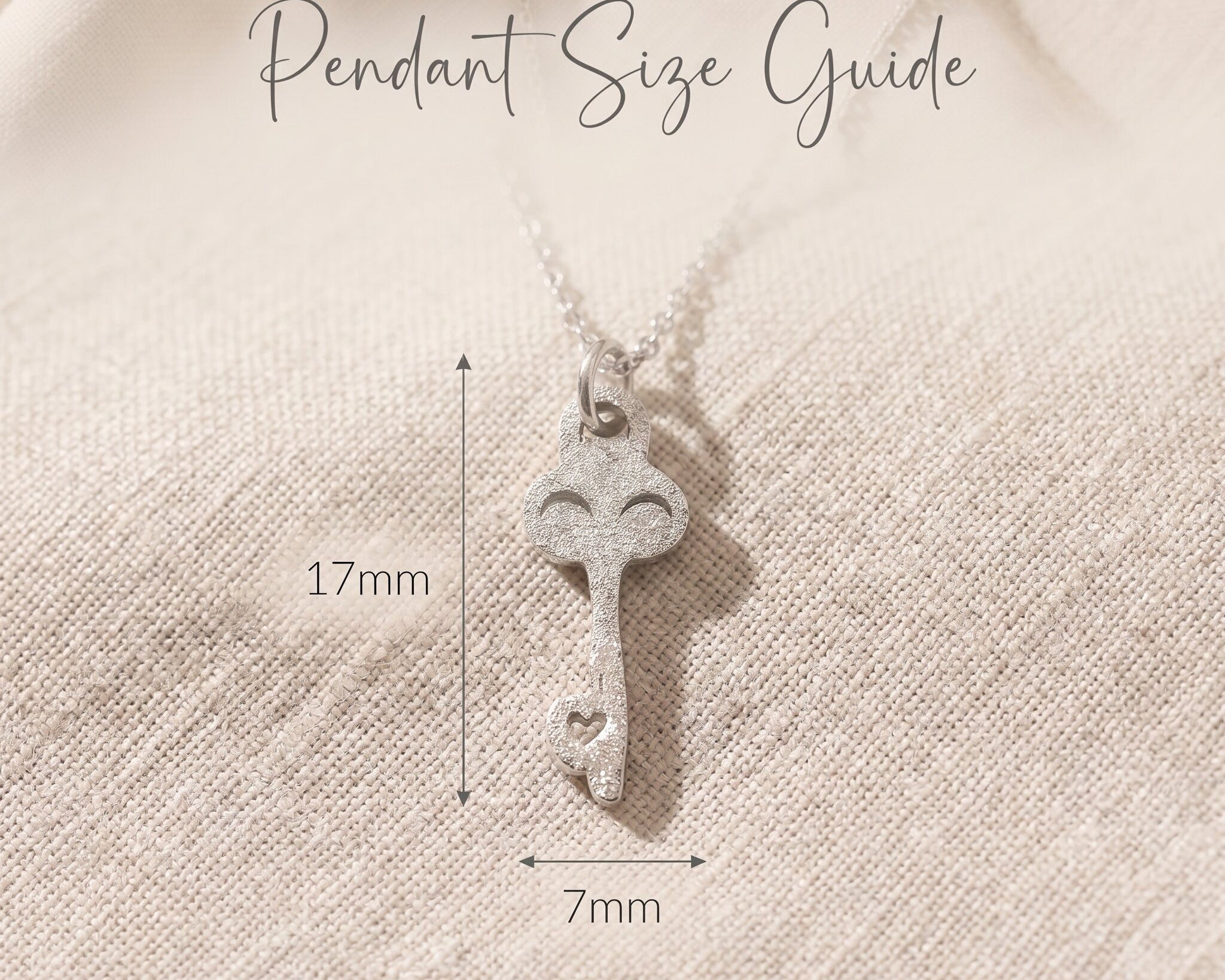 Open doors necklace size guide showing pendant dimensions and delicate design detail