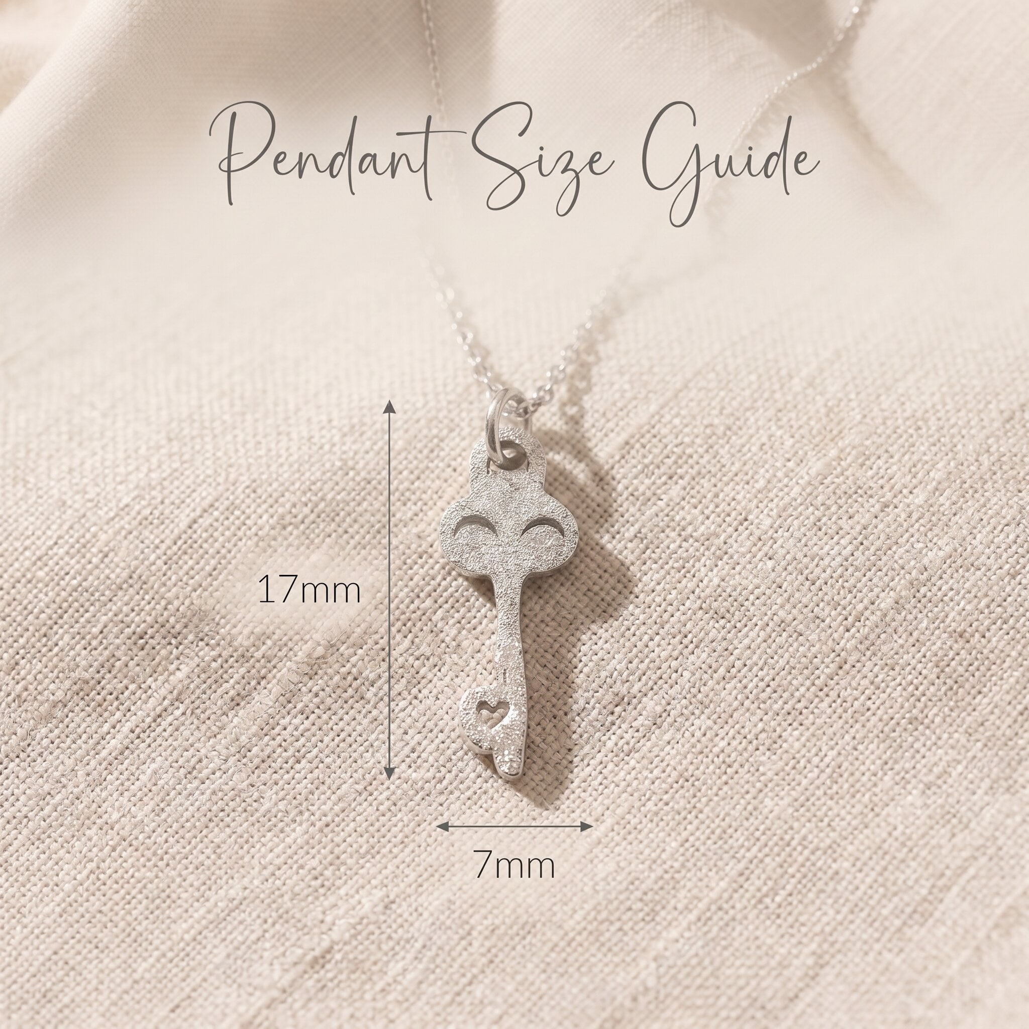 Open doors necklace size guide showing pendant dimensions and delicate design detail