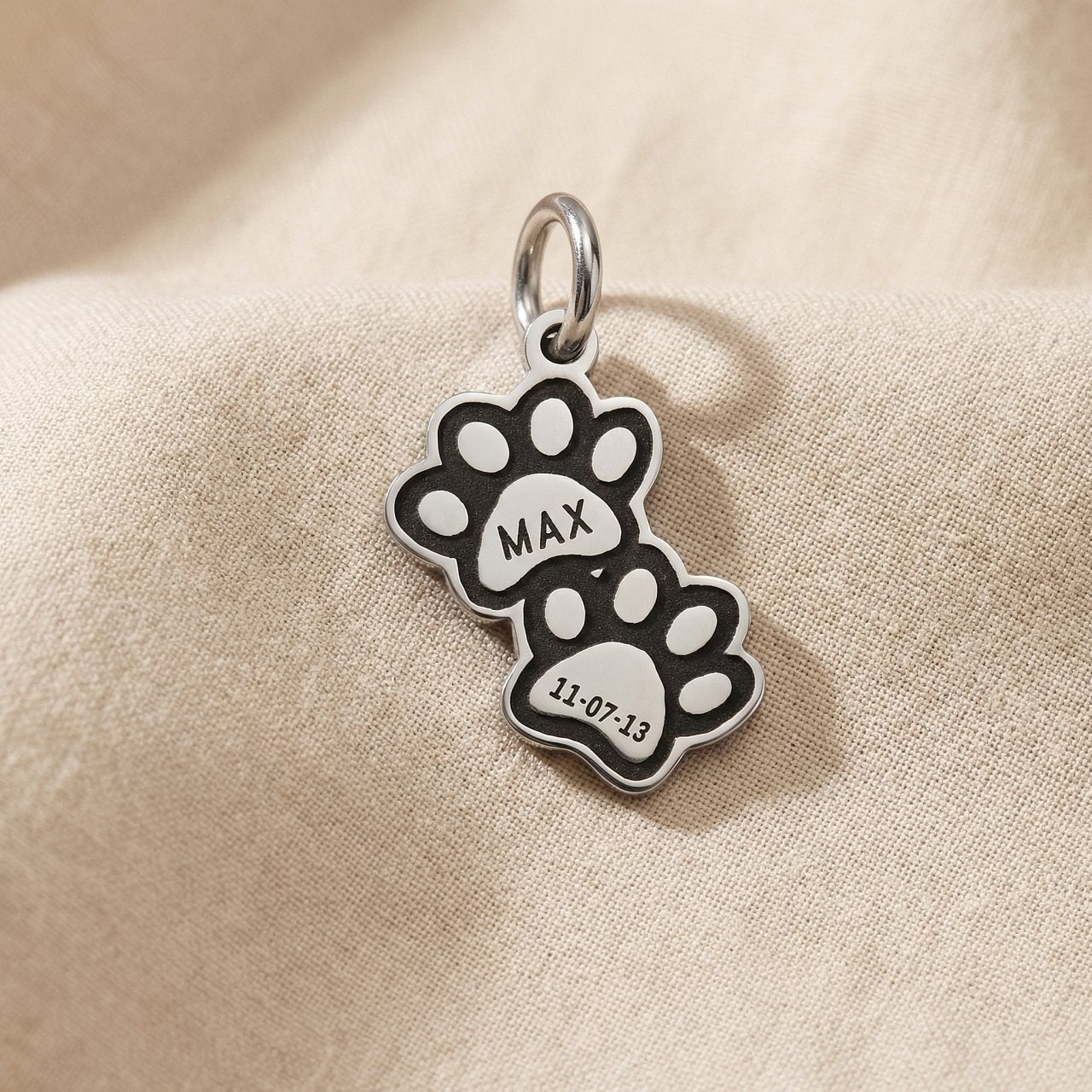 Double paw print charm for keyring designed for pet lovers and memorial keepsake memories