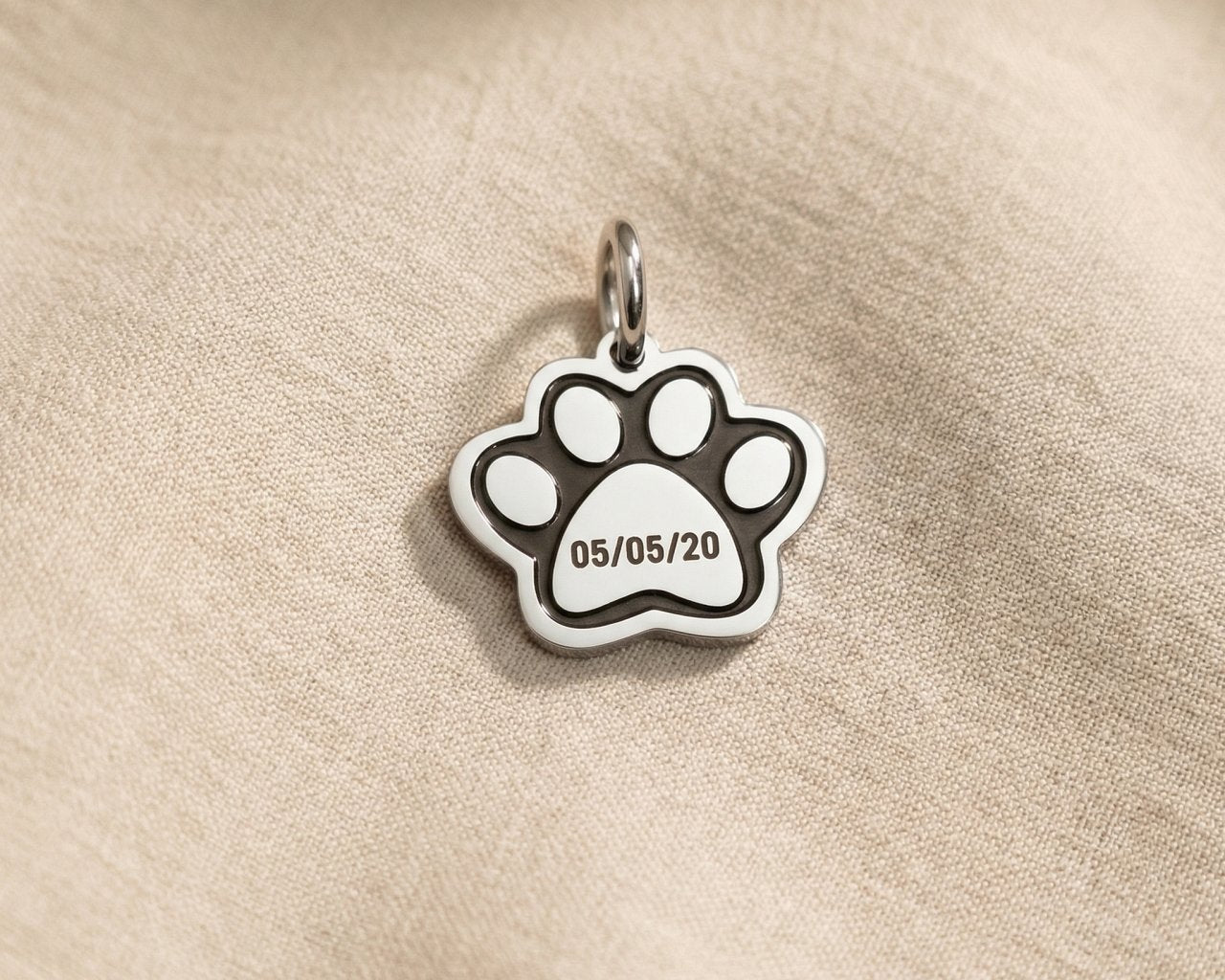 Single paw print charm for keyring symbolizing pet love, companionship, and meaningful remembrance