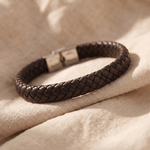Personalised brown braided leather bracelet with polished metal clasp, designed as a timeless everyday keepsake