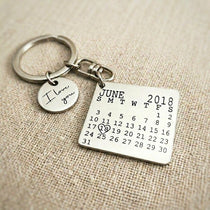 Silver personalised calendar keyring with engraved date calendar tag design