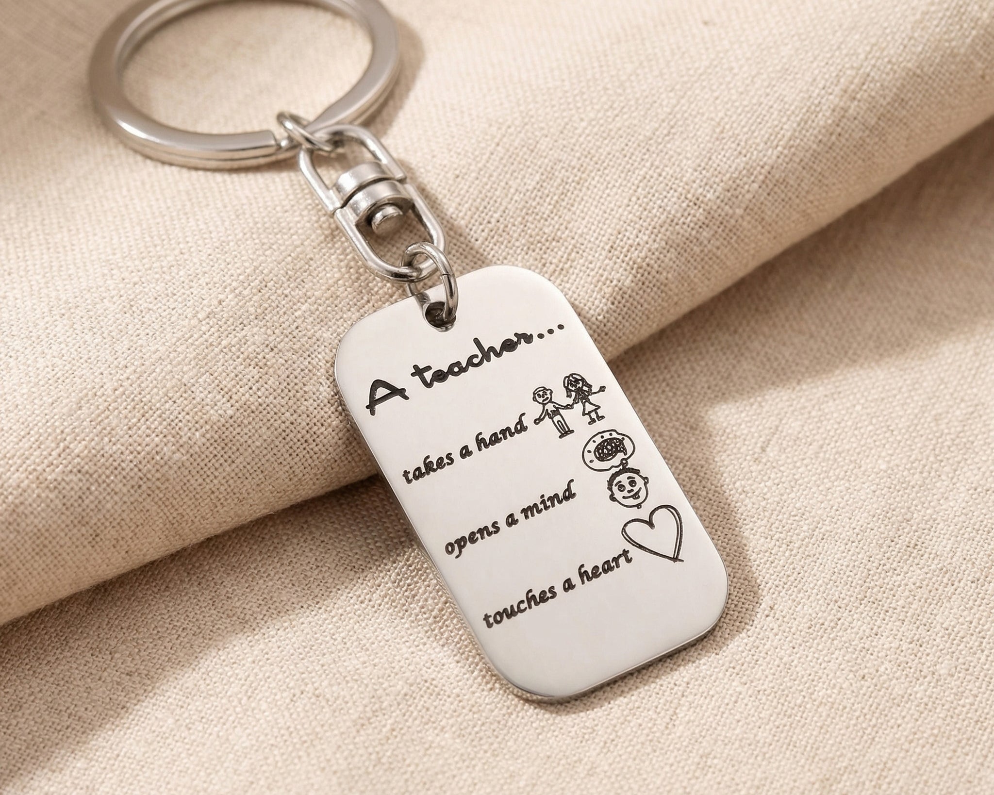 Personalised dog tag keyring in silver with engraved message, classic minimalist design