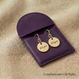 Personalised earrings displayed with elegant jewelry gift wallet packaging