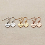 Personalised earrings showing heart shape options with engraved name customization