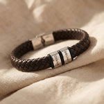 Personalised leather bracelet with silver engraved charms, classic custom jewellery piece
