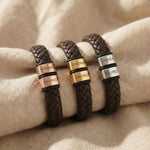Personalised braided leather bracelets with engraved names shown in gold, rose gold, and silver finishes for colour comparison.