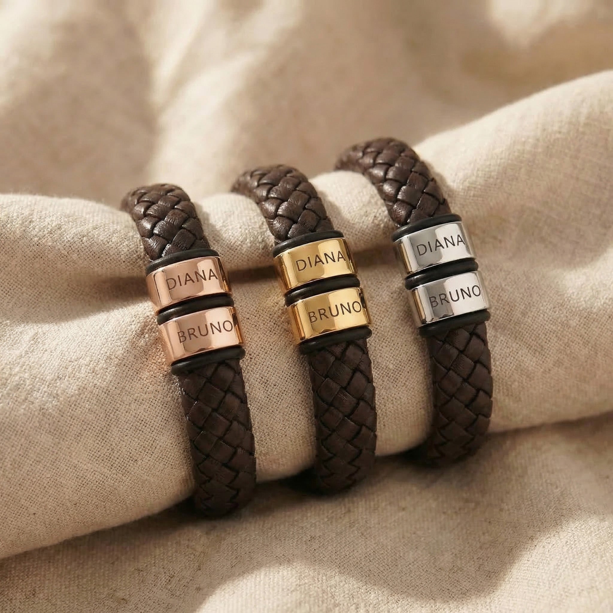 Personalised braided leather bracelets with engraved names shown in gold, rose gold, and silver finishes for colour comparison.