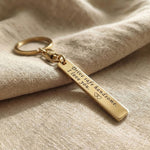 Personalised tag keyring in gold with engraved message, minimal keepsake design