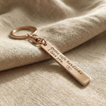 Personalised tag keyring in rose gold with engraved message, elegant gift design