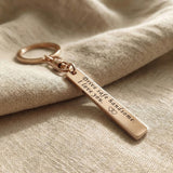 Personalised tag keyring in rose gold with engraved message, elegant gift design