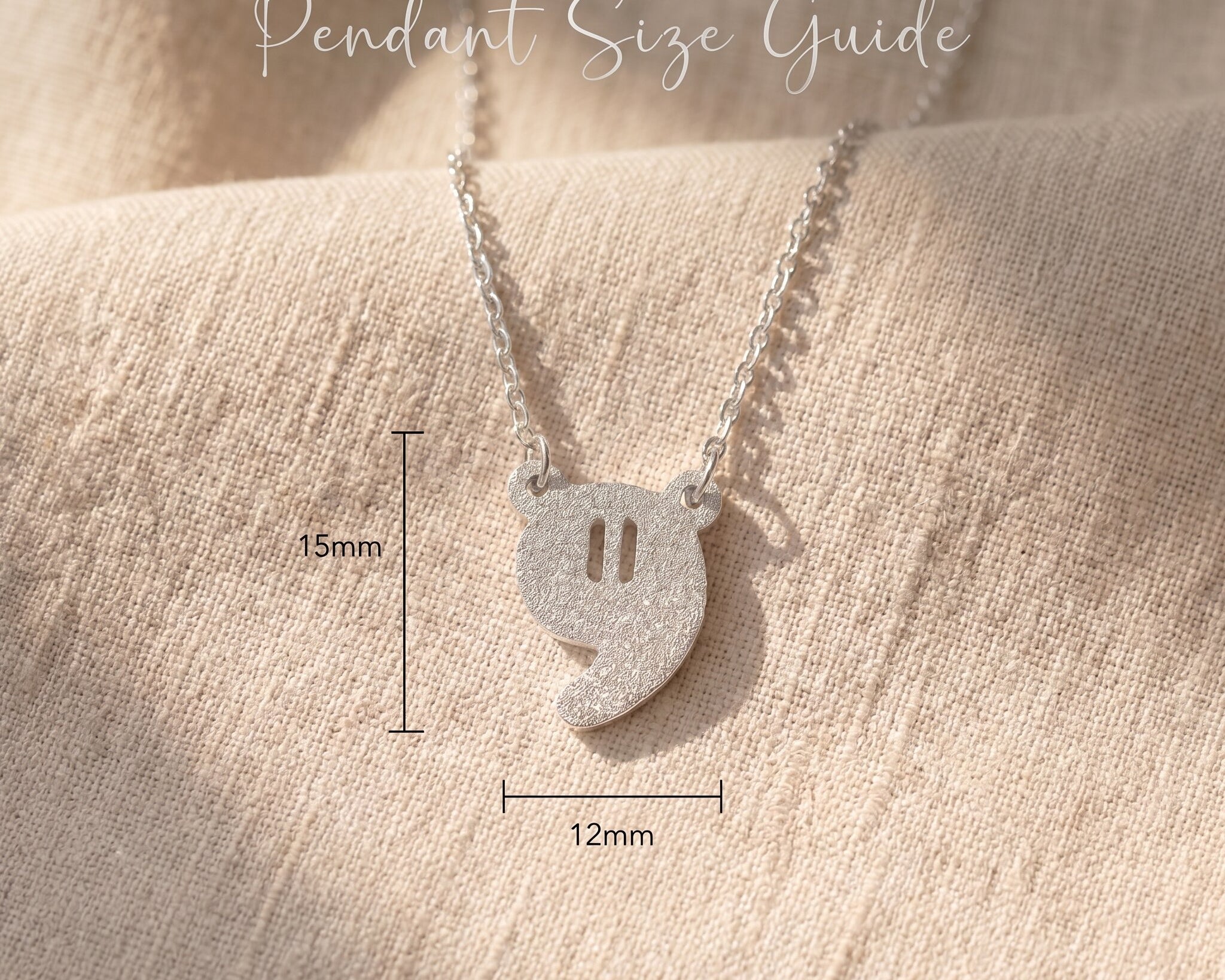 Power of pause necklace size guide showing pendant dimensions and clean symbolic design