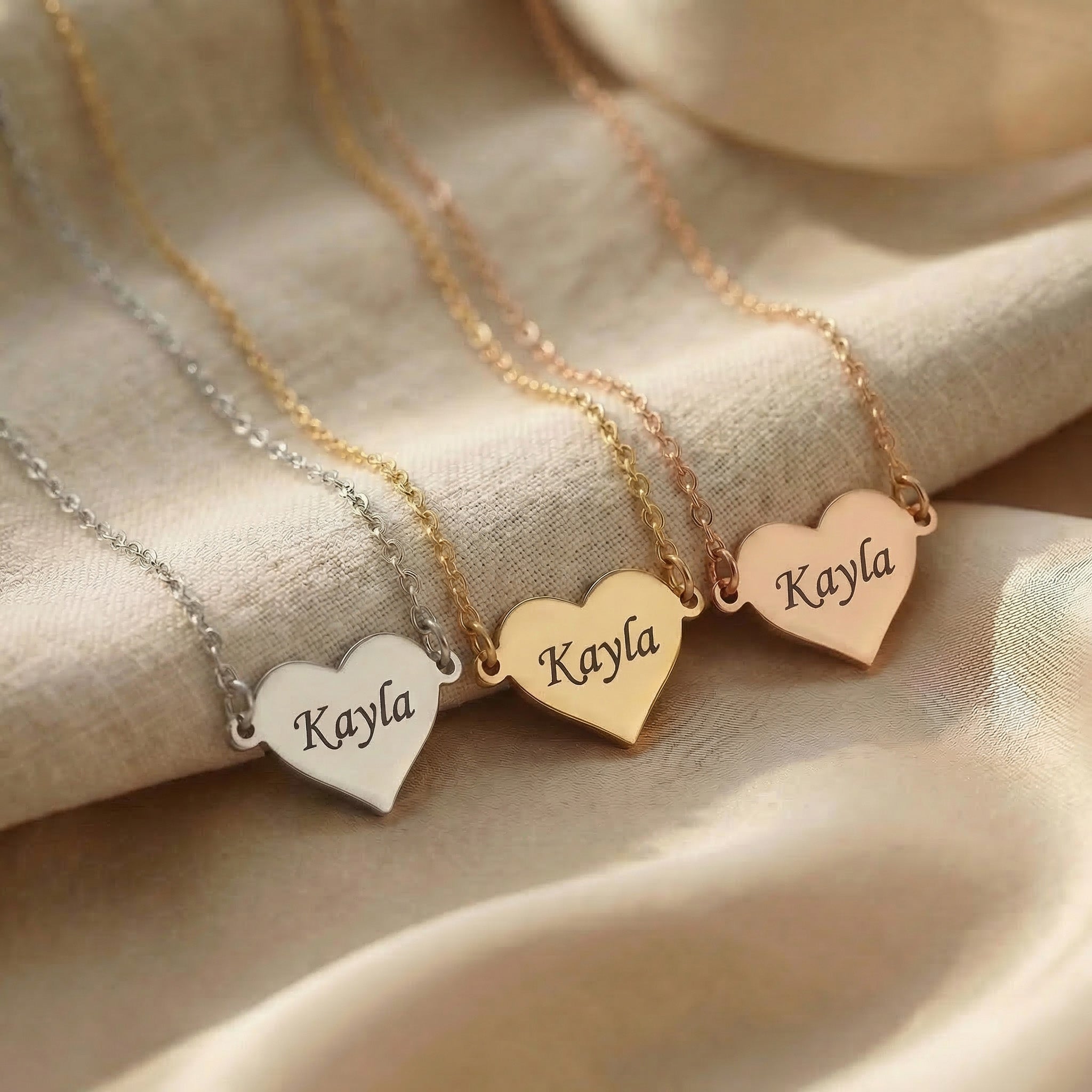 Personalised heart necklace tone comparison showing gold, silver and rose gold finishes