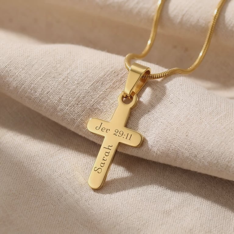 Product video showing cross name necklace with engraved name on cross pendant