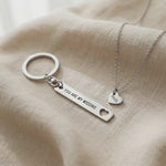 Video showing missing piece necklace and keyring set with engraved detail and matching design