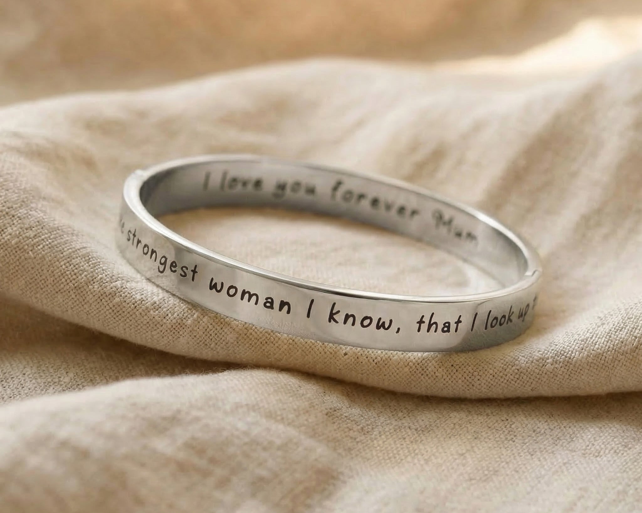 Personalised promise bangle in silver with engraved message, classic minimalist style