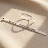 Professional ring sizer tool for accurate jewelry sizing with adjustable measuring bands in soft lighting
