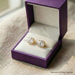 Round stud earrings presented in premium gift box, classic jewellery gift