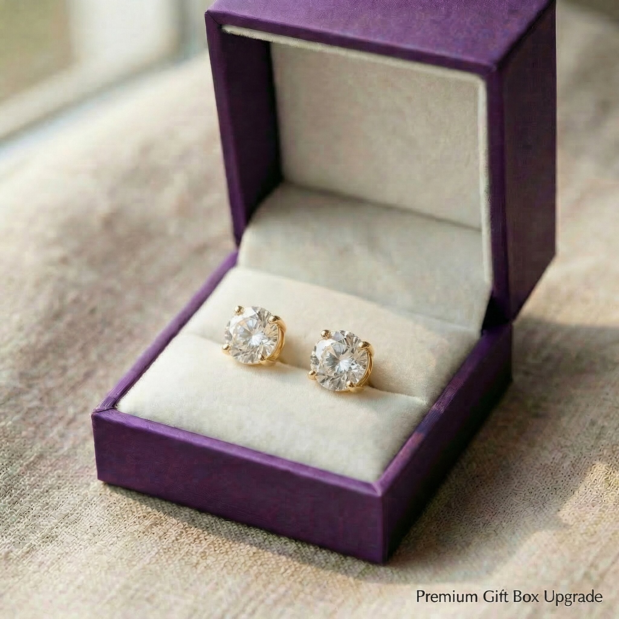 Round stud earrings presented in premium gift box, classic jewellery gift