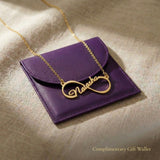 Single infinity name necklace displayed with gift wallet packaging, personalised jewellery gift