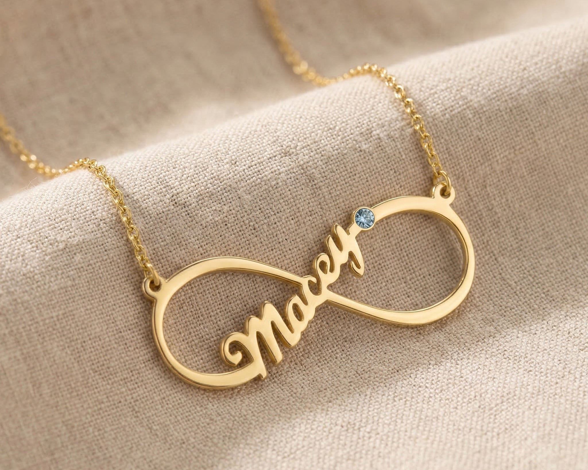 Single infinity name necklace option showing personalised name necklace with birthstone option