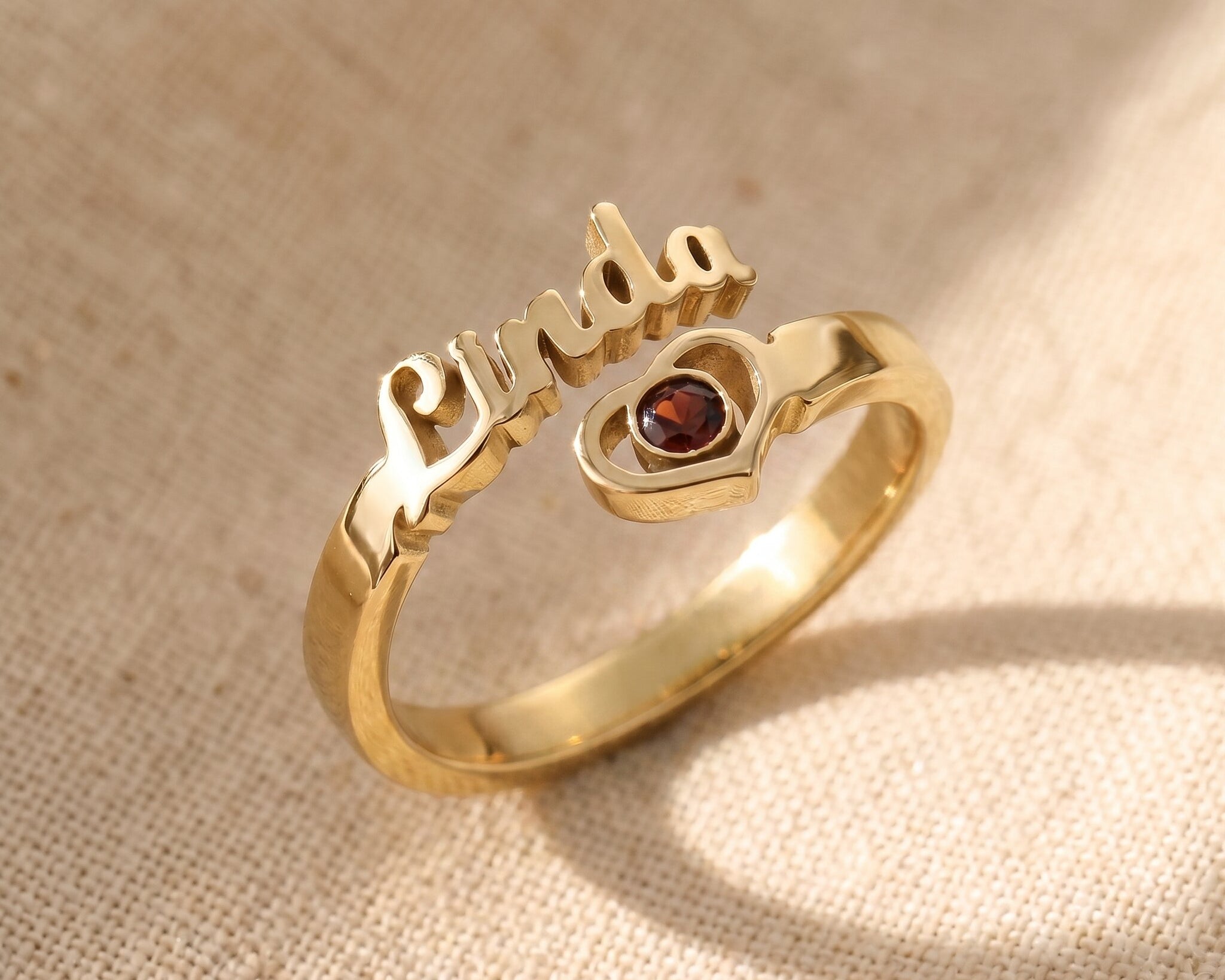 Single name ring in gold with custom engraved name and birthstone, elegant jewellery gift