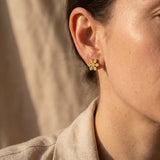 Woman wearing sparkling snowflake earrings, elegant winter jewellery and thoughtful gift for her