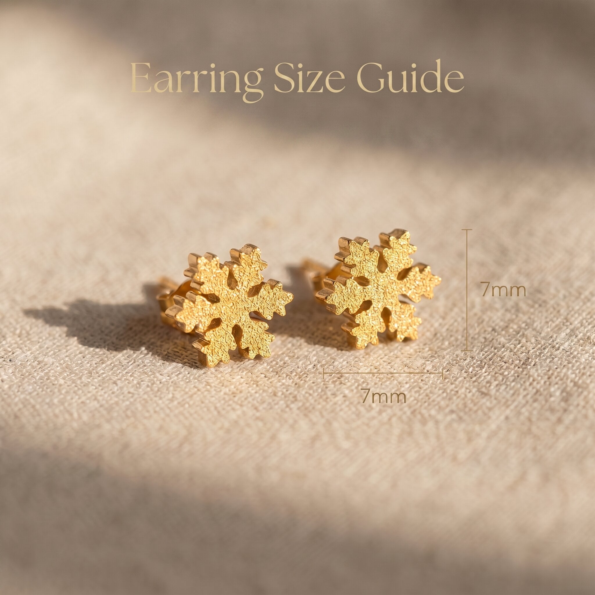 Sparkling snowflake earrings size guide showing stud dimensions and delicate crystal detail