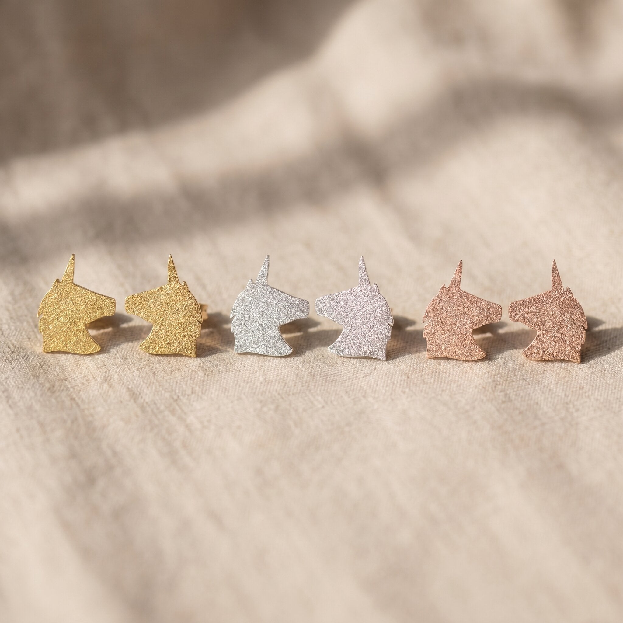 Sparkling unicorn earrings tone comparison showing gold, silver and rose gold cute jewellery options