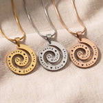 Swirl of time necklace tone comparison showing gold, silver and rose gold keepsake jewellery finishes