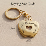 Teacher keyring size guide showing apple-shaped keyring dimensions and engraved detail