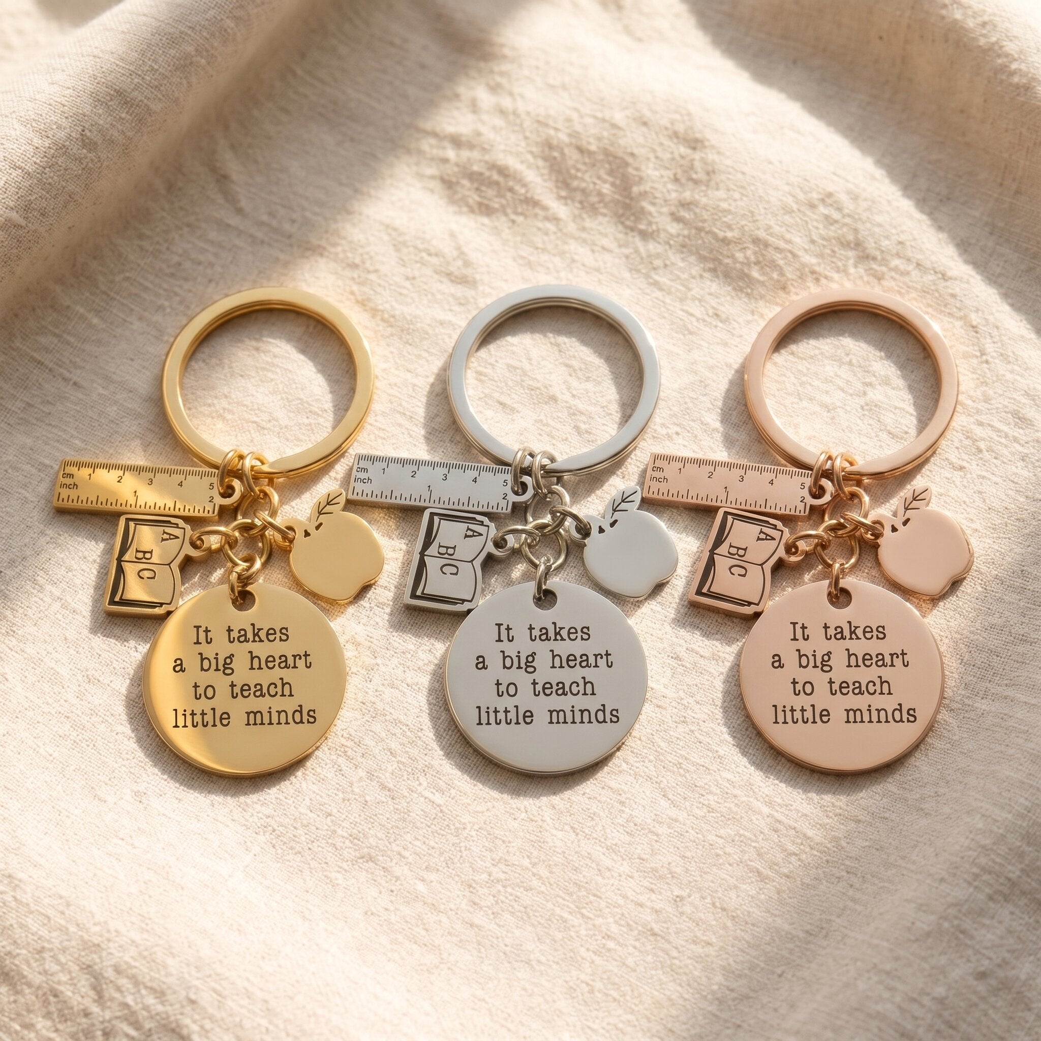 Teacher life keyring tone comparison showing gold, silver and rose gold engraved appreciation gift finishes