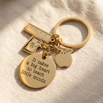 Teacher life keyring in gold with engraved message, book, ruler and apple charm, thoughtful teacher appreciation gift