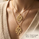 Tree of life necklace worn showing chain length and pendant size on neckline
