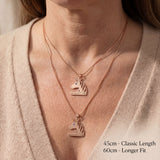 Unicorn head name necklace worn showing chain length with personalised name detail