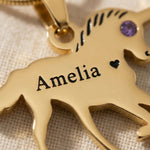 Close-up of unicorn name necklace with engraved name and unicorn silhouette detail