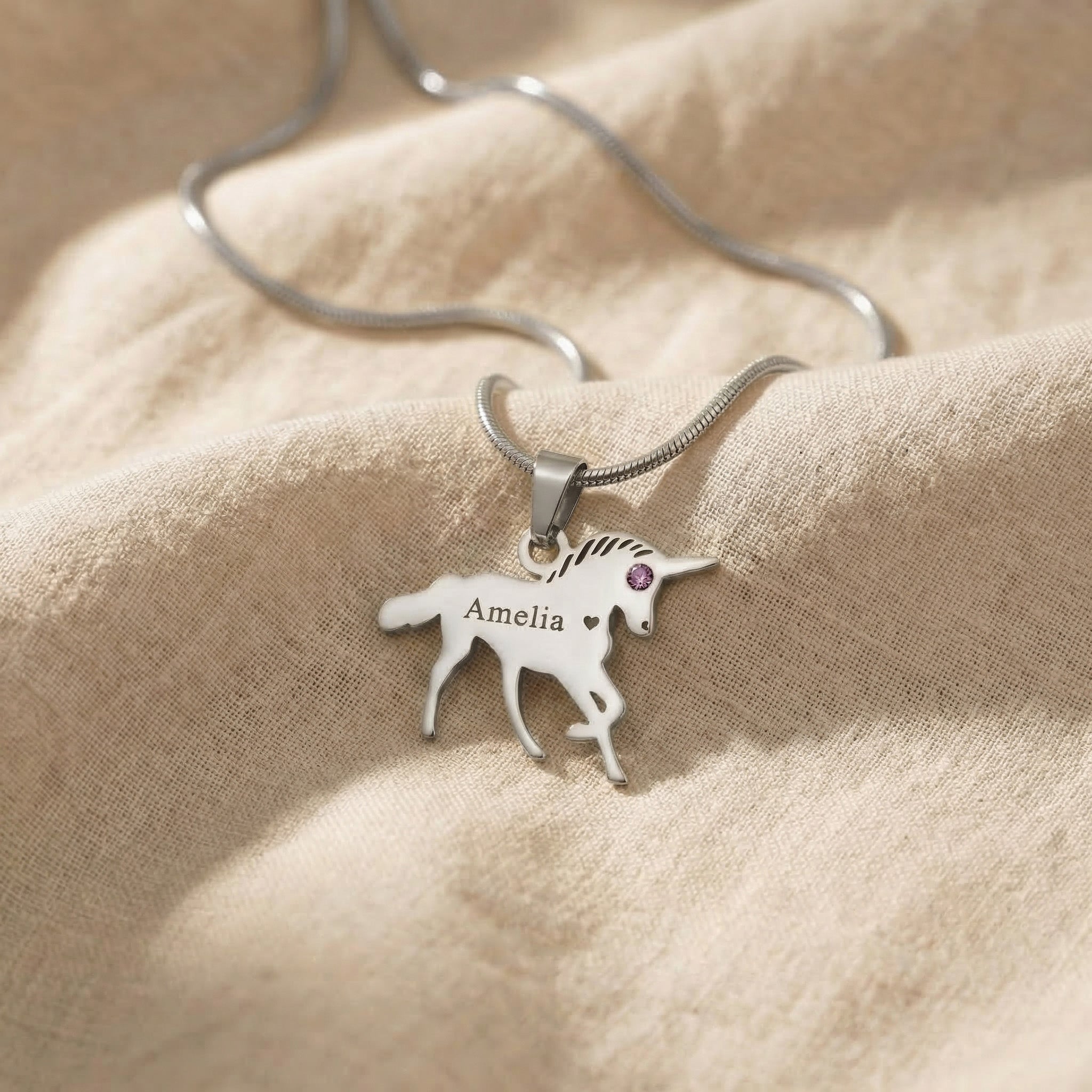 Unicorn name necklace in silver with engraved name and unicorn silhouette