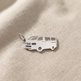 Silver people mover van charm for keyring symbolizing family travel, road trips, and shared life memories